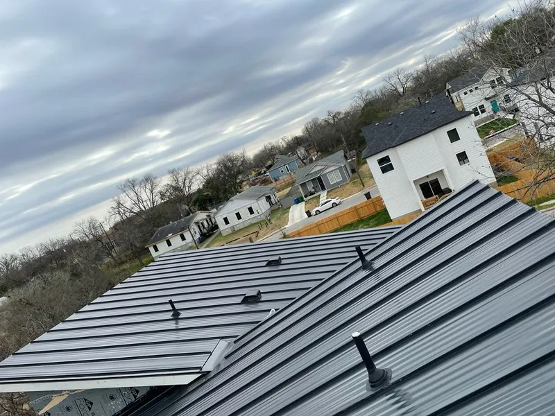 Standing seam metal roof panels with vents for Skylight Repair in Greenville